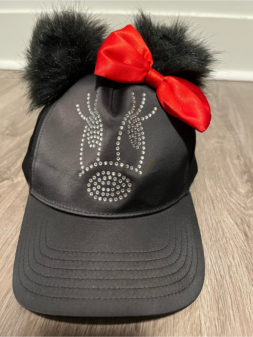 Disney Parks Black Faux Fur Ear Cap with Red Bow and Rhinestones NWOT